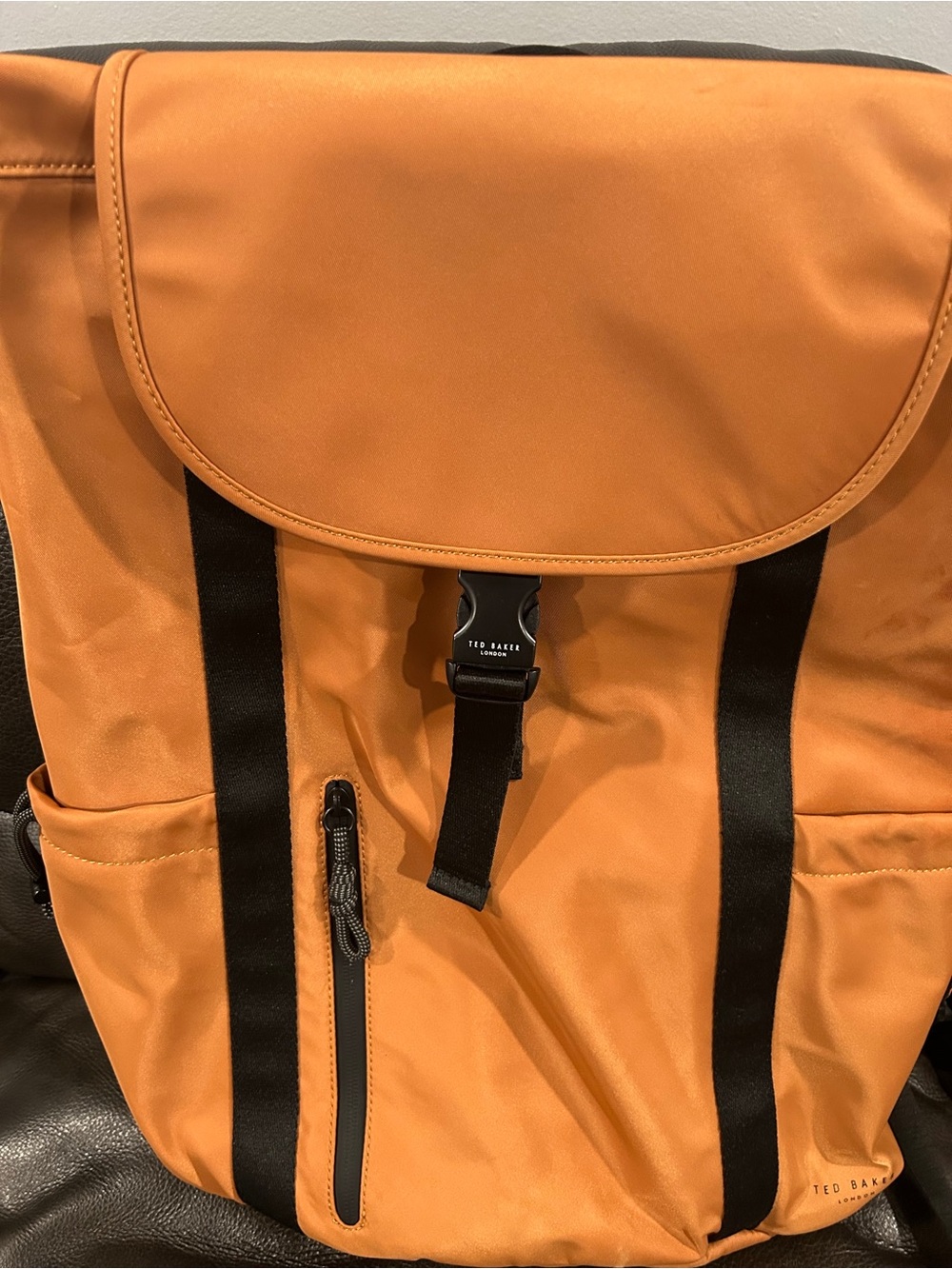 Ted Baker Orange Backpack with Black Strap Details